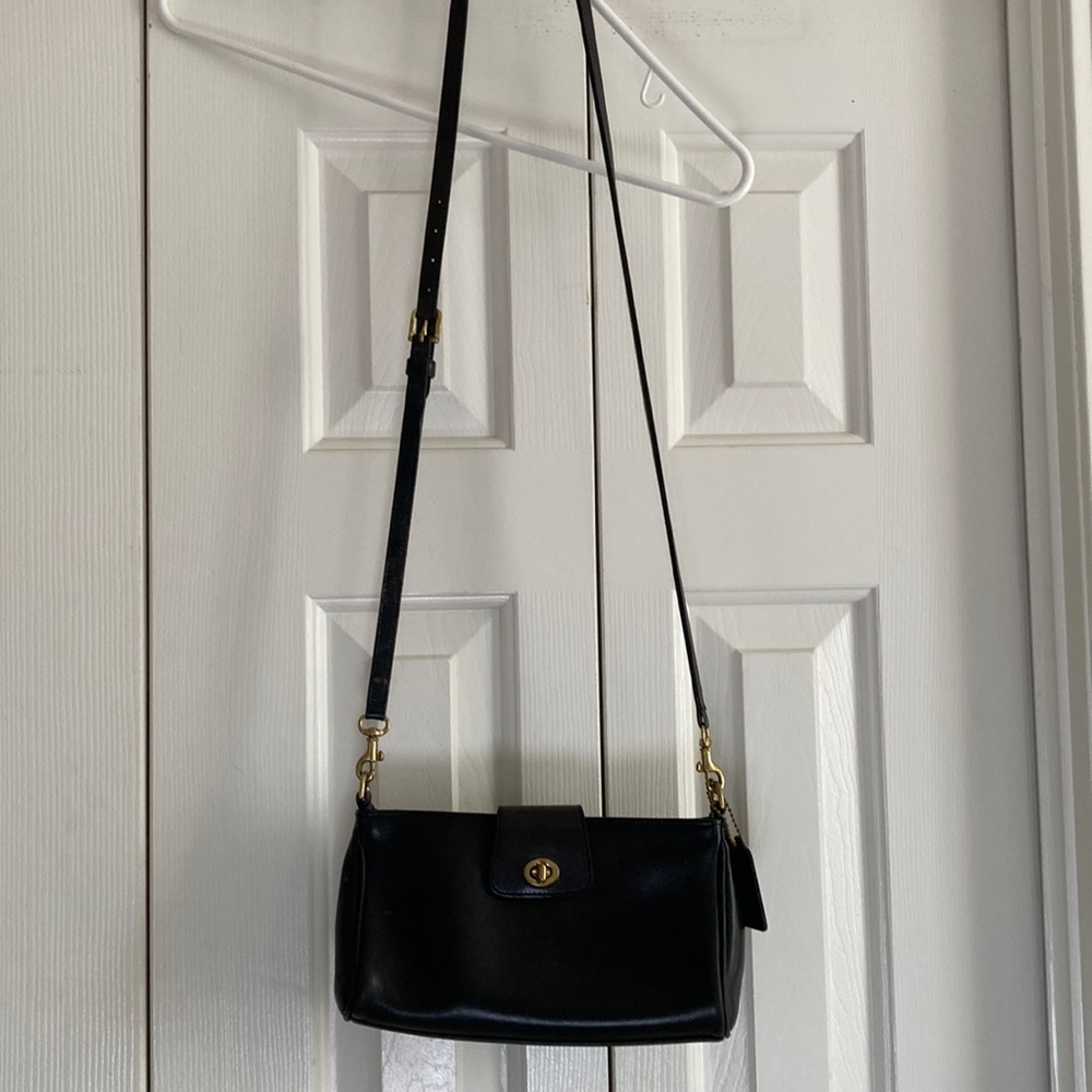 Coach black 9 x 5 x 2 leather crossbody (47” strap)